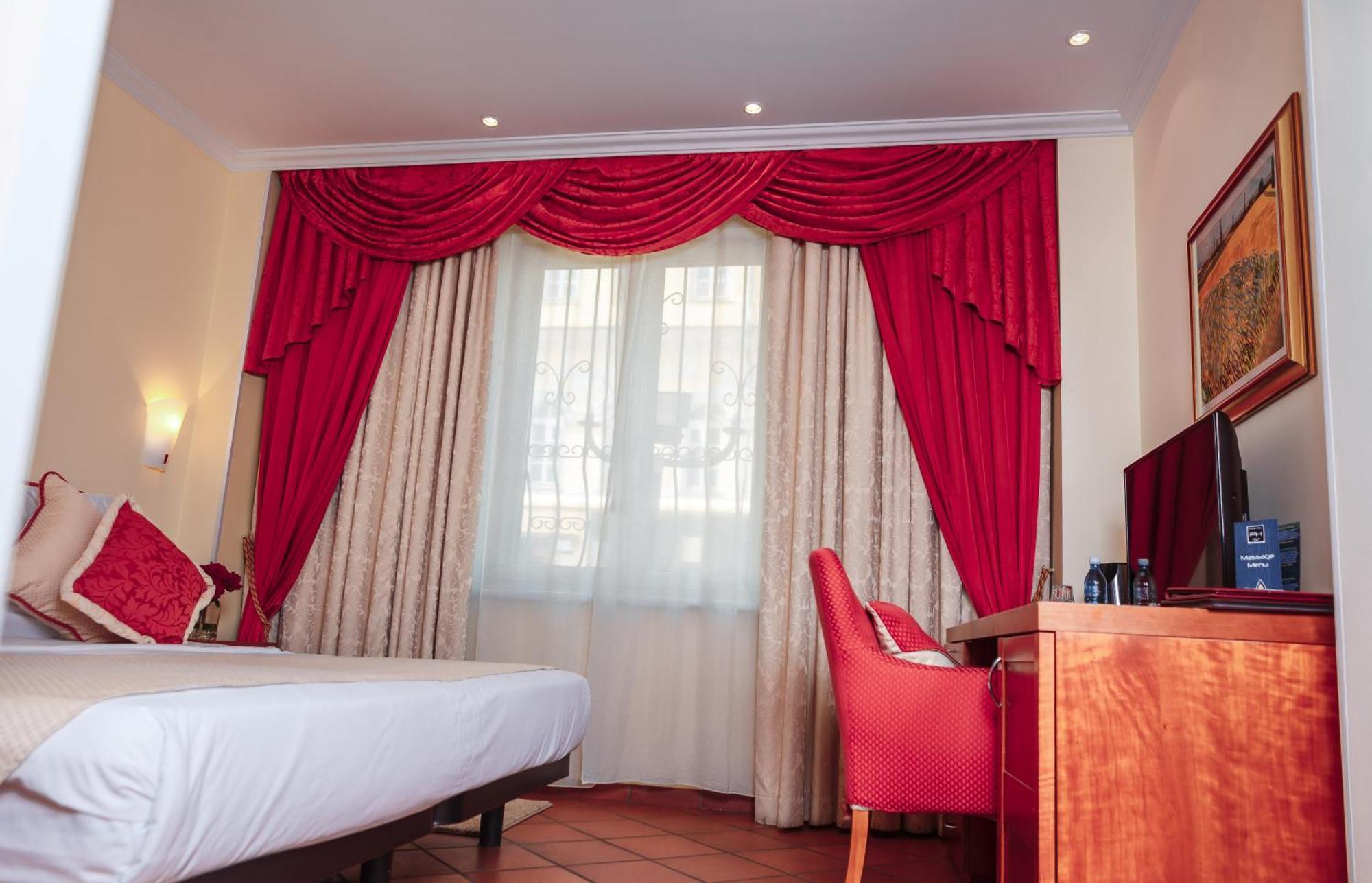 Hotel Pushkin Uralsk Oda fotoğraf